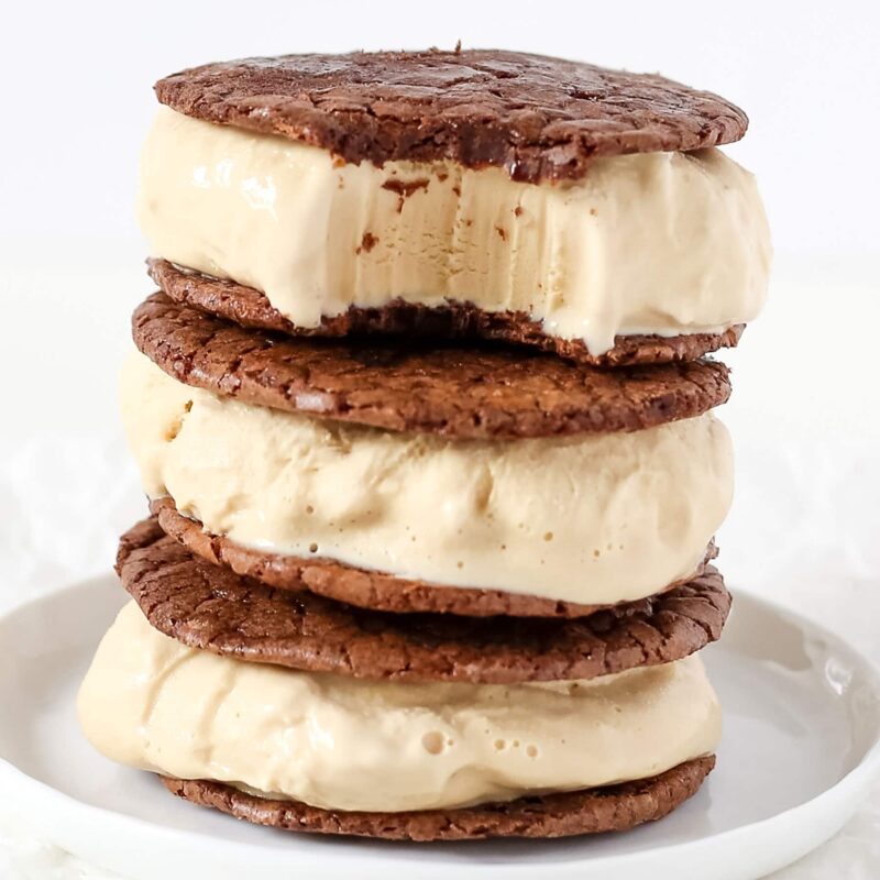 Coffee brownie ice cream sandwiches made with rich, fudgy brownie cookies and creamy cold brew coffee ice cream, perfect for dessert and ice cream photography.