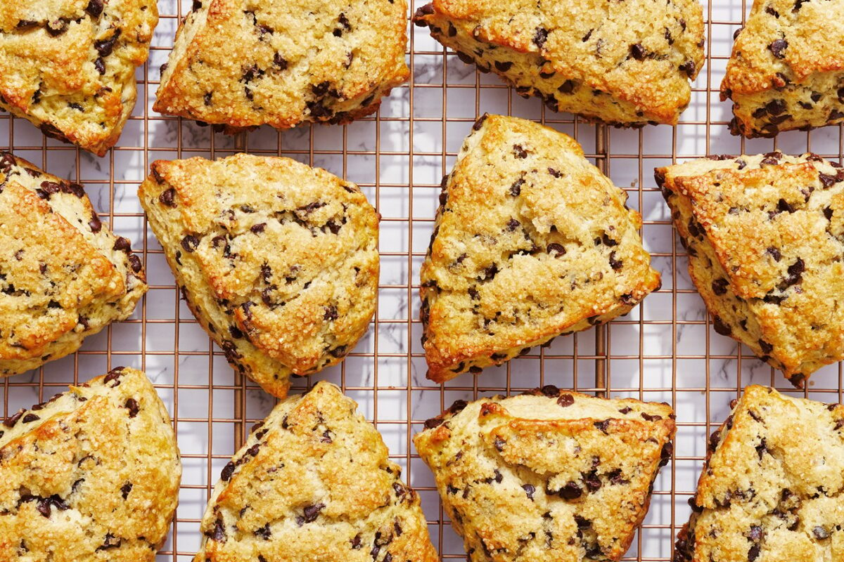 Homemade chocolate chip scones on a cooling rack